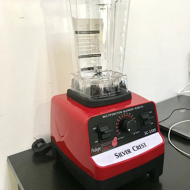 Red multifunctional juicer blender with 3000W motor, container, and base for kitchen food processing