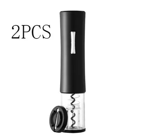 Black electric wine opener with transparent cover and aluminum foil cutter on wooden table