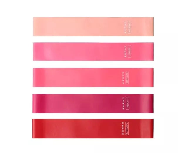Yoga tension band set in five colours with varying resistance levels for fitness and Pilates
