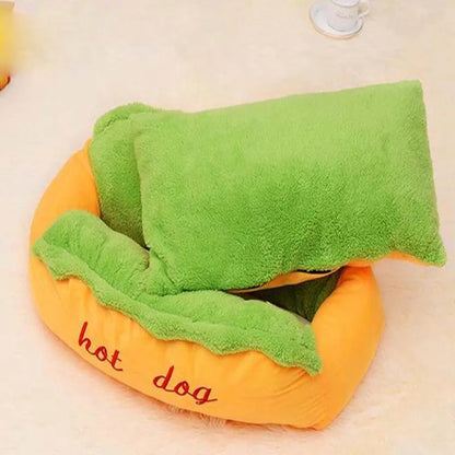 Brown sofa cushion style dog bed with removable mat, shown in a home setting.