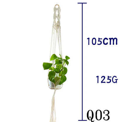 Handmade beige cotton rope net bag holding a plant pot, showing its textured sling design.