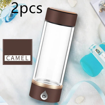 Portable hydrogen water ionizer bottle with high borosilicate glass cup in silver finish.