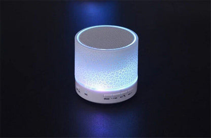 Compact wireless Bluetooth speakers in various colours, featuring premium audio components and sleek, durable design