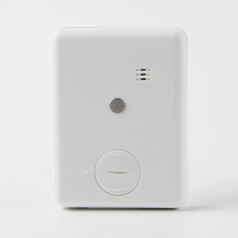 Digital kitchen timer with magnetic back showing countdown display in black or white options