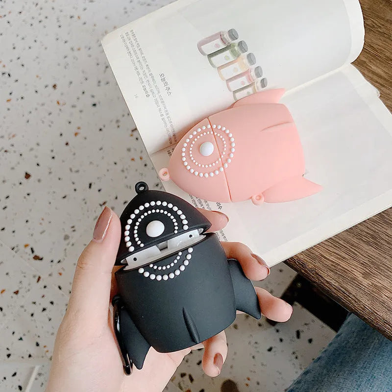Pink silicone protective cover on an AirPods charging case.