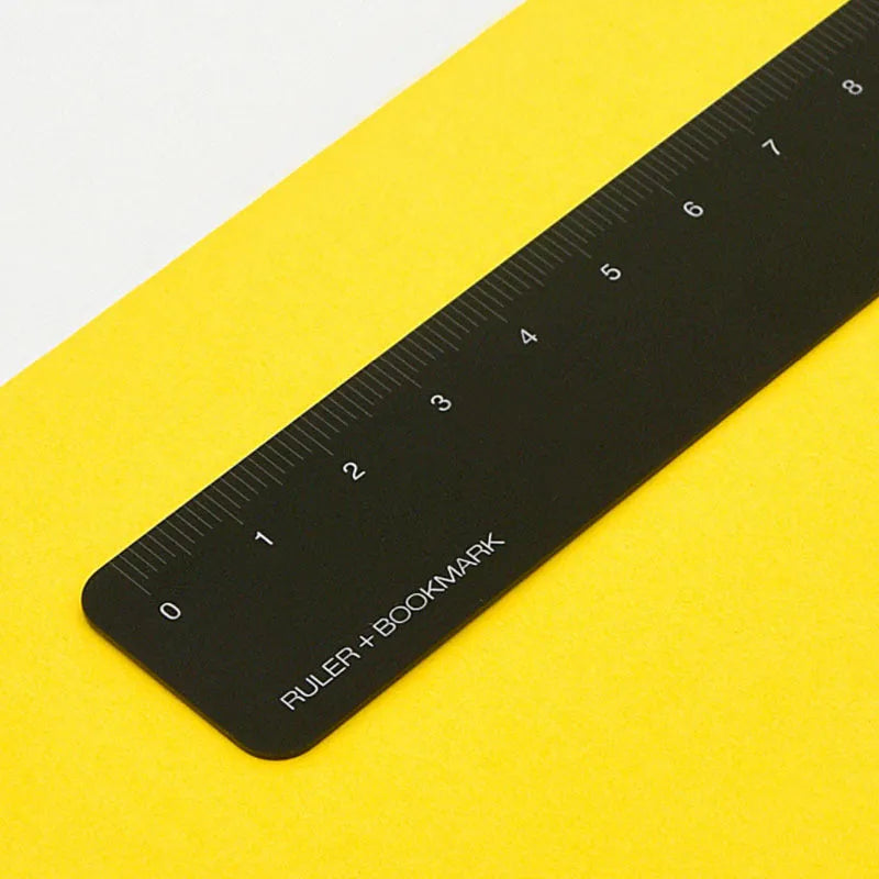 15cm black metal bookmark ruler with a laser-engraved scale on an aluminium alloy body.