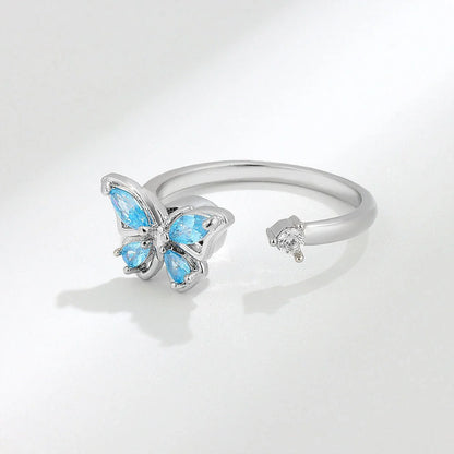 Women's adjustable rotatable butterfly ring with zircon inlay, available in multiple designs