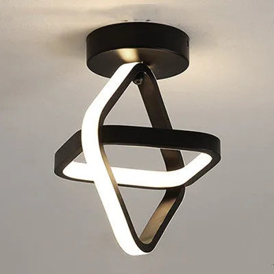 Modern round ceiling light with 21cm diameter and 25cm height in black or white finish