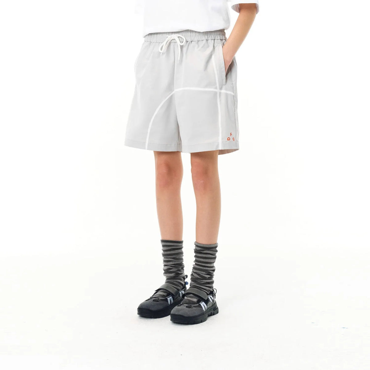 Men's dark grey loose fit drawstring shorts made from high elasticity polyester fabric.