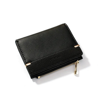 Multi card slot short zipper ladies wallet in 2-fold design with PU leather exterior showing internal compartments
