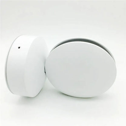 Aluminium LED spotlight bar wall lamp with glass lens, shown in a corridor setting.