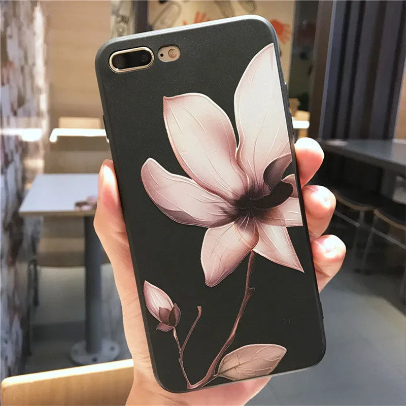 Embossed floral TPU phone case in black and white colour options showing floral pattern detail.