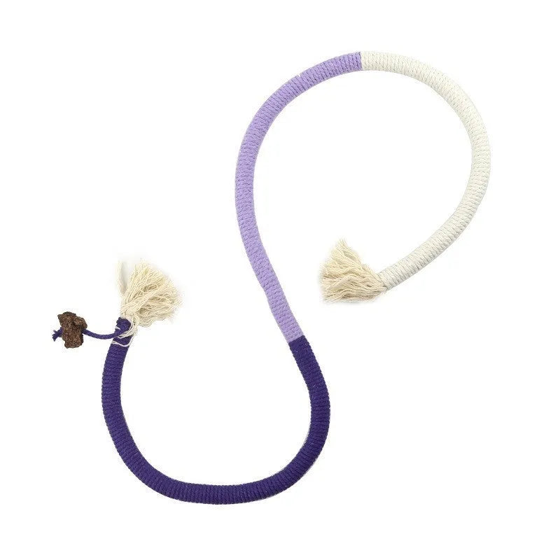 A 70cm long cotton string cat bite rope toy in three colour options: purple, orange, and red with green.