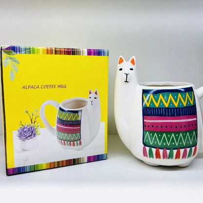 White ceramic mug with cartoon alpaca pattern and handle