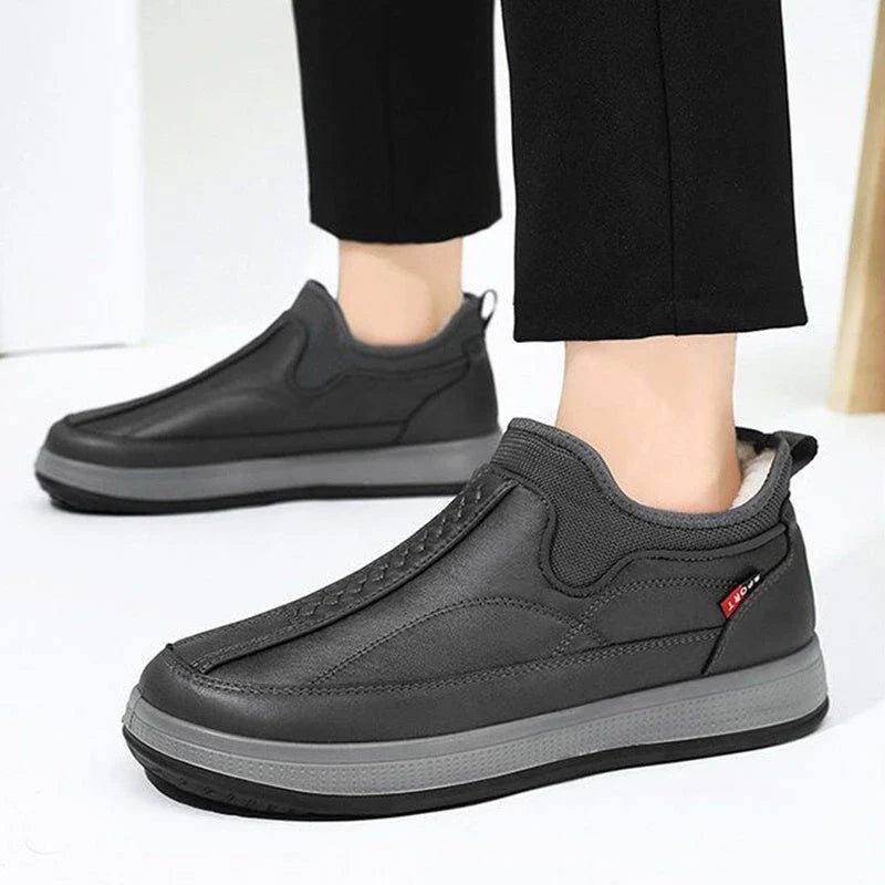 Cozy winter snow boots with fleece lining, round toe, and non-slip rubber sole for warmth and traction in cold weather