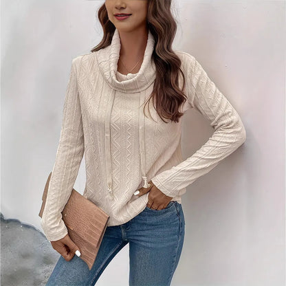 Apricot coloured women's hooded pullover sweater with drawstring and long sleeves