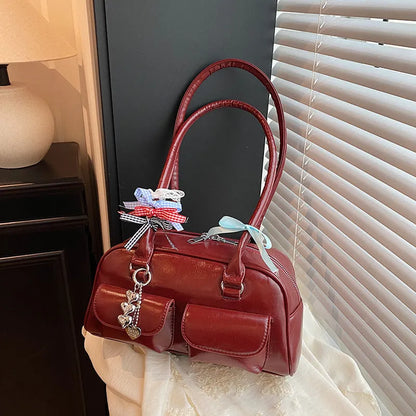 Women's retro pillow-shaped handbag in PU leather with double shoulder straps and flap closure