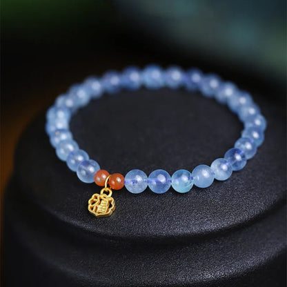 Ice translucent aquamarine crystal bracelet with 8mm round beads and sequin accents