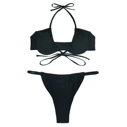 Women's black and mint green split-style bikini swimsuit made from nylon fabric.