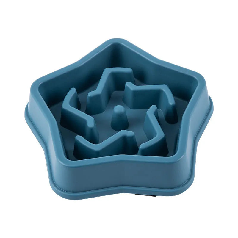 Yellow plastic slow feeding dog bowl with raised obstacles at base to prevent choking
