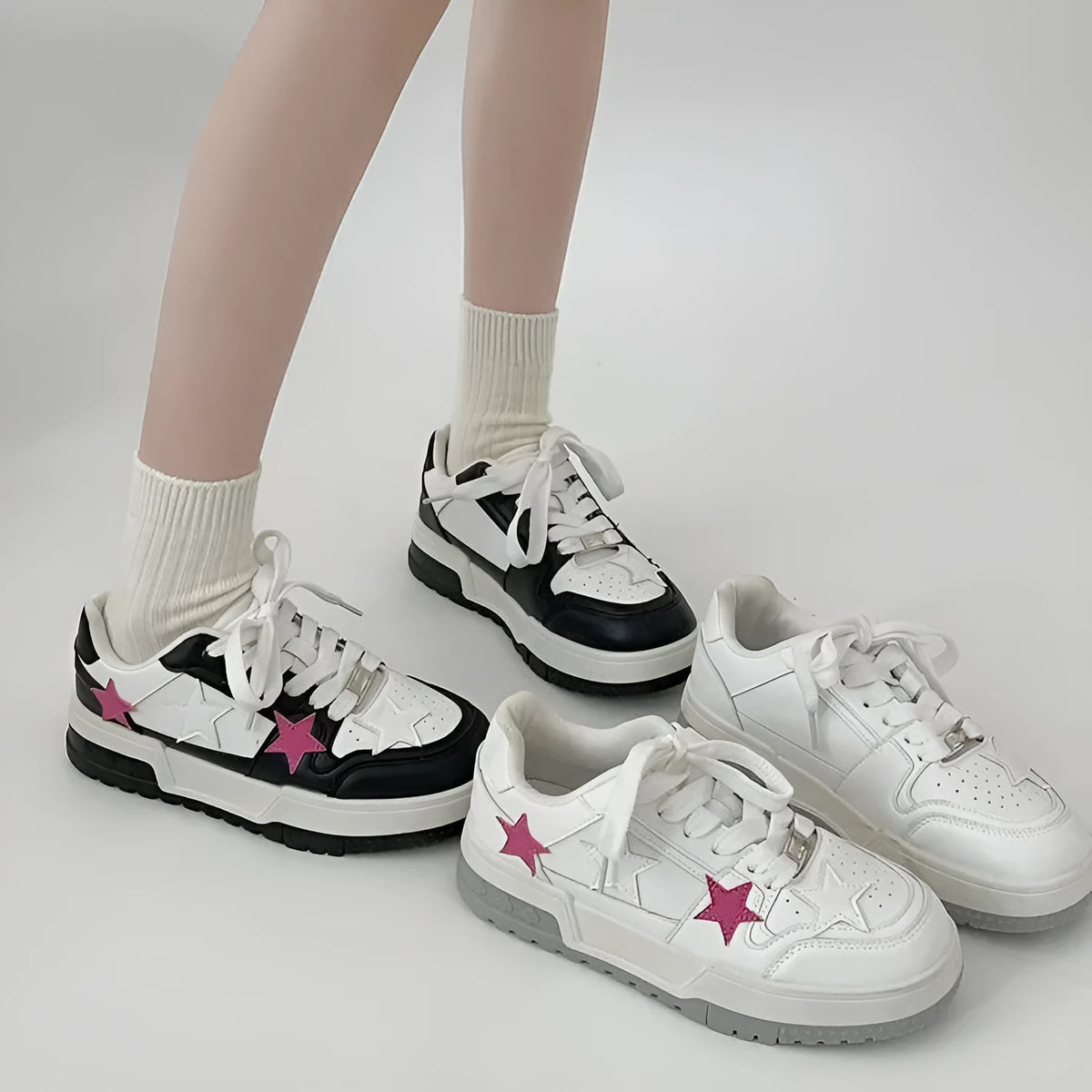 Women's Korean style low-top sneakers in black or white with PU upper, round toe, and front lace-up fastening, sizes 35-40