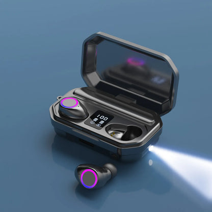 Black and white wireless Bluetooth earplug headphones with a charging case featuring an LED digital power display.