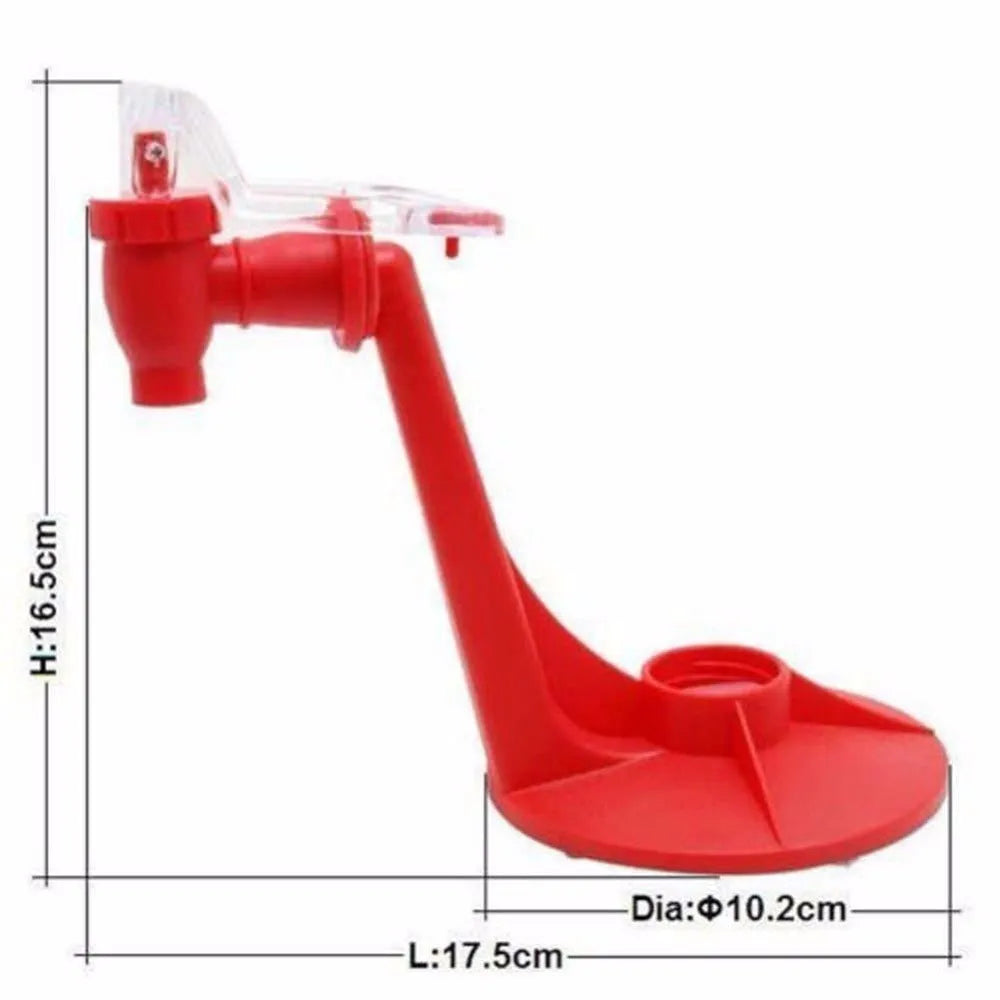 Red plastic Magic Tap soda bottle dispenser attached to an inverted 2-litre bottle on a kitchen table.