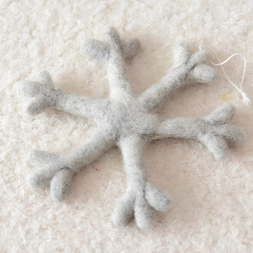 19cm wool felt snowflake and 13cm star Christmas decorations with intricate cut-out patterns