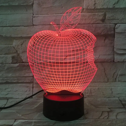 Colourful 3D fruit design LED night light with touch control on a table.