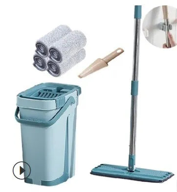 Blue flat floor mop with rotating head and microfiber pad beside plastic bucket for floor cleaning