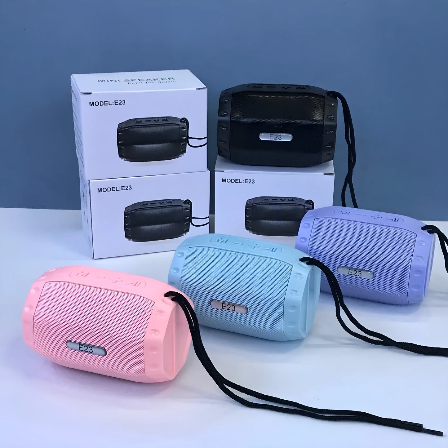 Wireless USB card Bluetooth speaker in four colour options showing compact design