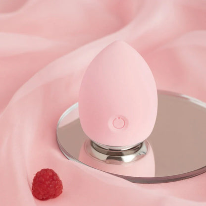 Electronic Cleansing Egg in pink and blue, compact beauty tool for deep skin cleansing