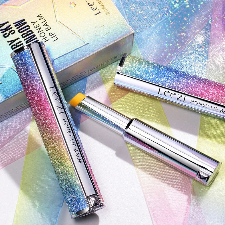 Rainbow Star colour changing lipstick tube showing honey shade transforming to pink on lips