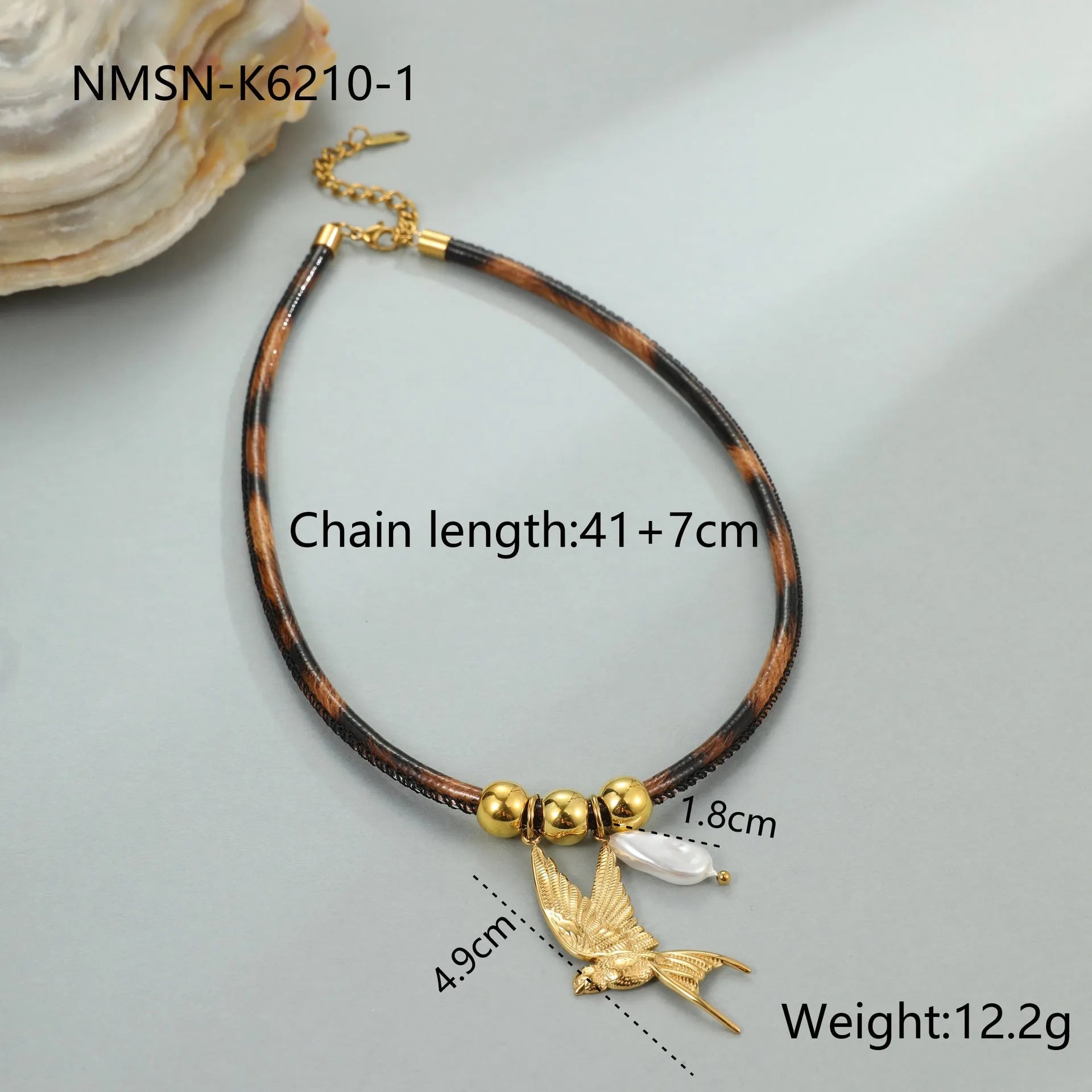Women's stainless steel necklace with geometric leopard pendant, gold electroplated, on an adjustable chain.