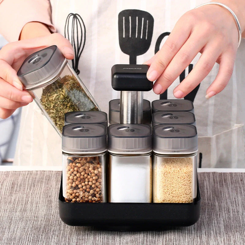 European Style Rotating Glass Seasoning Bottle Set with 8 Spice Jars on countertop