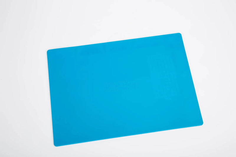Watch repair rubber table mat for watchmakers and jewellers, anti-skid silicone work desk mat in blue, provides a secure non-slip surface for delicate watch and jewellery repair tasks