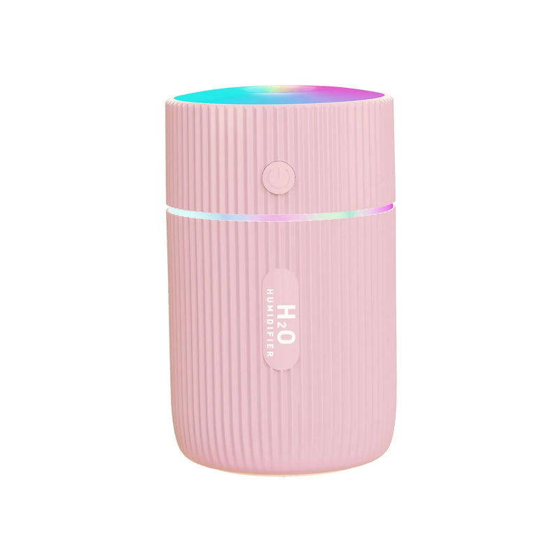 Portable ultrasonic essential oil diffuser humidifier with 300ml capacity, USB-powered for car and home use, mist-making function for air purification, available in black, green, pink and white colours measuring 115x68x68mm