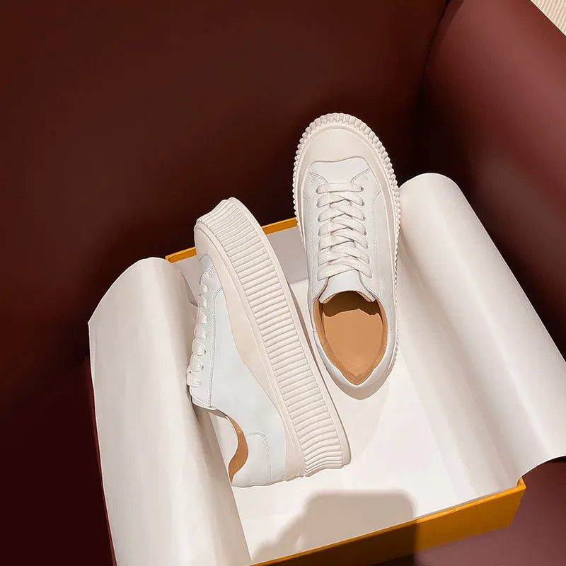Women's chunky sole ankle boots with cross-lacing detail and cowhide suede upper in white colour
