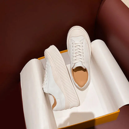 Women's chunky sole ankle boots with cross-lacing detail and cowhide suede upper in white colour