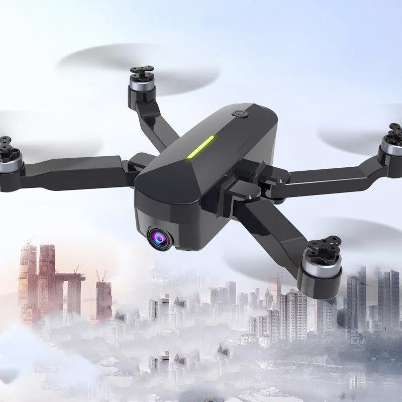 Brushless GPS drone with 4K HD camera in technology grey, folded size 12.8x10x5.5cm, for aerial photography.
