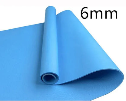 EVA composite fitness and yoga mat in blue, showing its texture and rolled edge next to a storage bag.