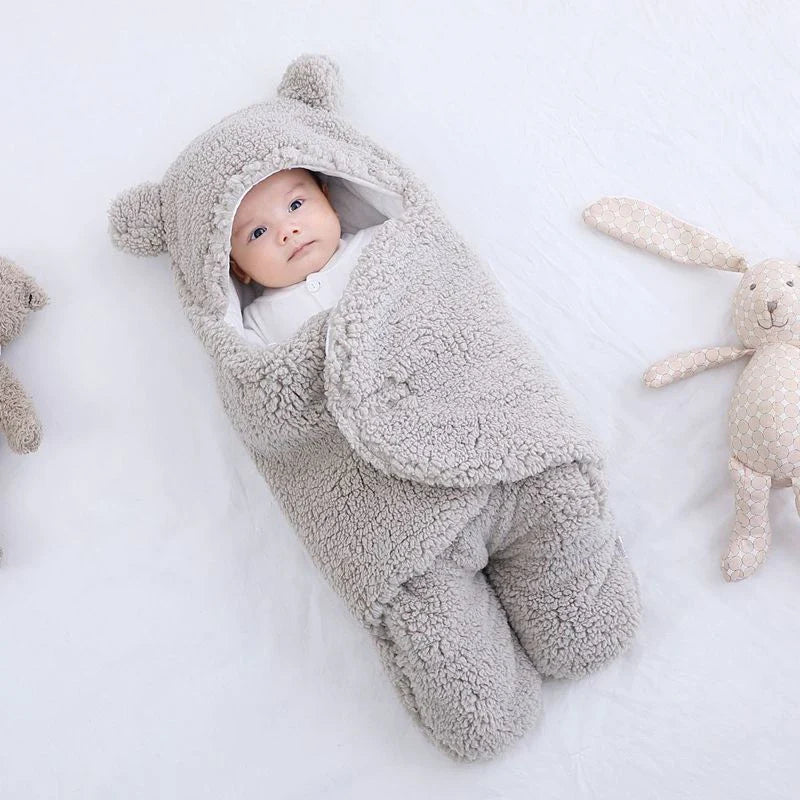 Cozy cotton baby sleeping bag with soft, breathable interior and warm, insulating outer layer