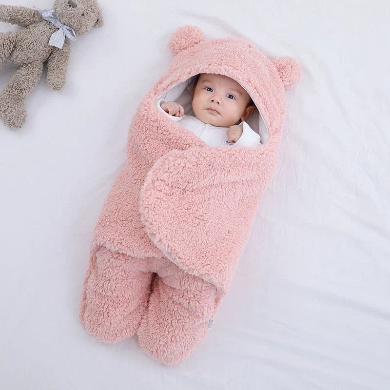 Cozy cotton baby sleeping bag with soft, breathable interior and warm, insulating outer layer