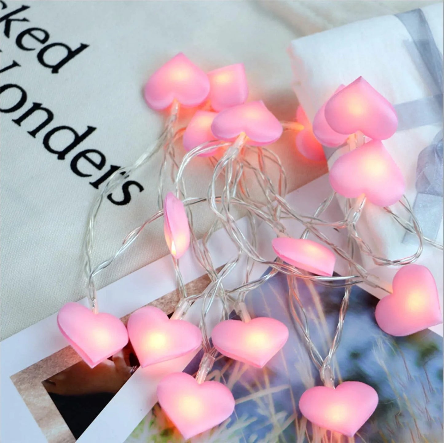 Pink heart-shaped LED fairy lights on 3-metre cable for bedroom or wedding decoration