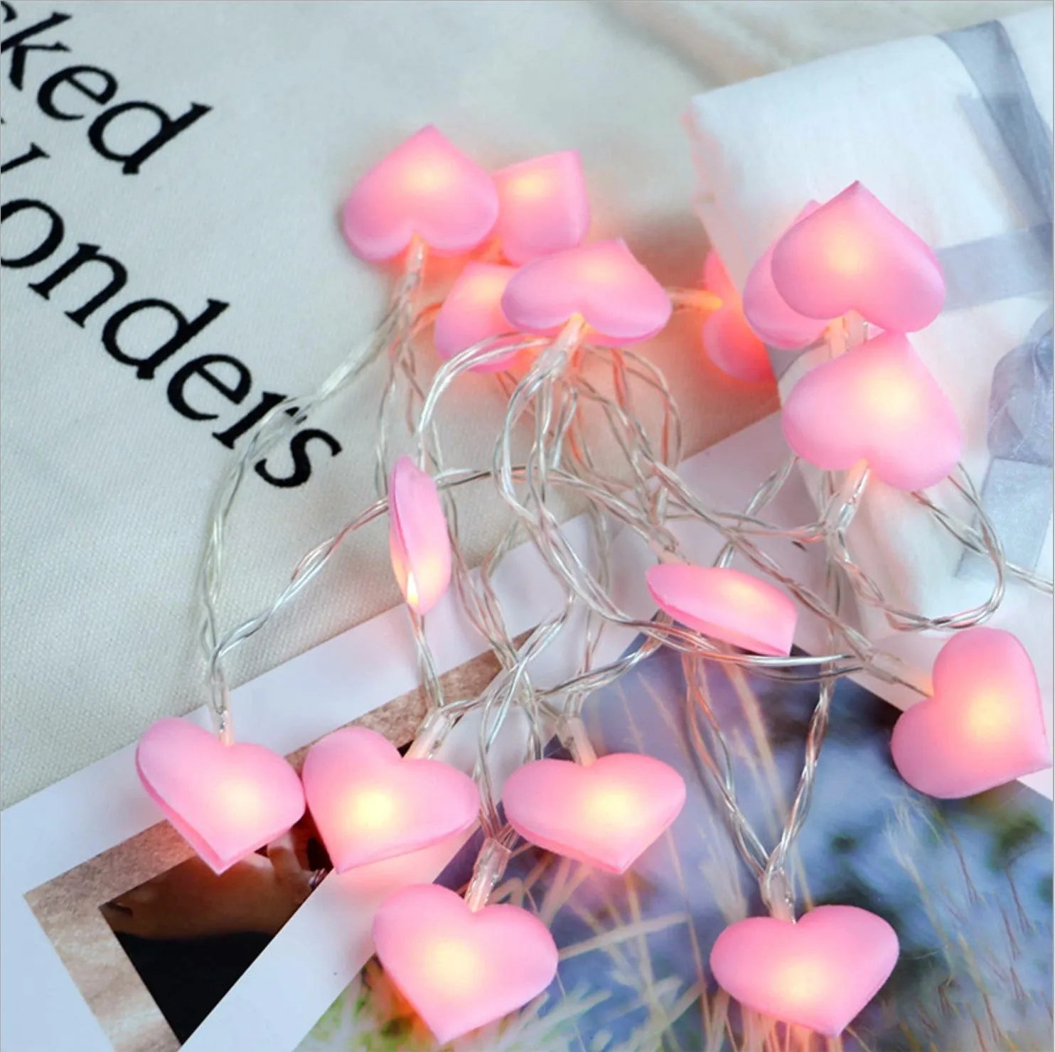 Pink heart-shaped LED fairy lights on 3-metre cable for bedroom or wedding decoration