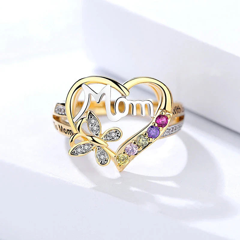 A shimmering heart-shaped jewelry set with a multicolor rhinestone design, including a ring and coordinating necklace, a thoughtful Mother's Day gift.