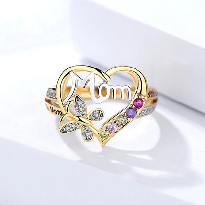 A shimmering heart-shaped jewelry set with a multicolor rhinestone design, including a ring and coordinating necklace, a thoughtful Mother's Day gift.