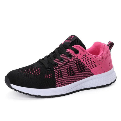 Women's white high-top trainers with cross-bind belt and hollow-out design on black background