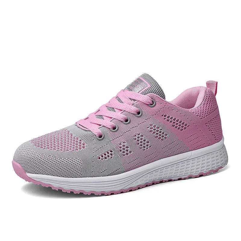 Women's white high-top trainers with cross-bind belt and hollow-out design on black background