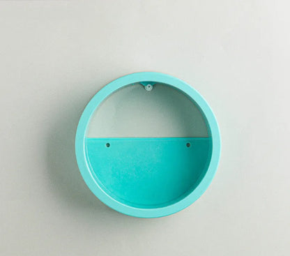 Round iron style plastic wall vase hanging basket for flowers in multiple colour options.